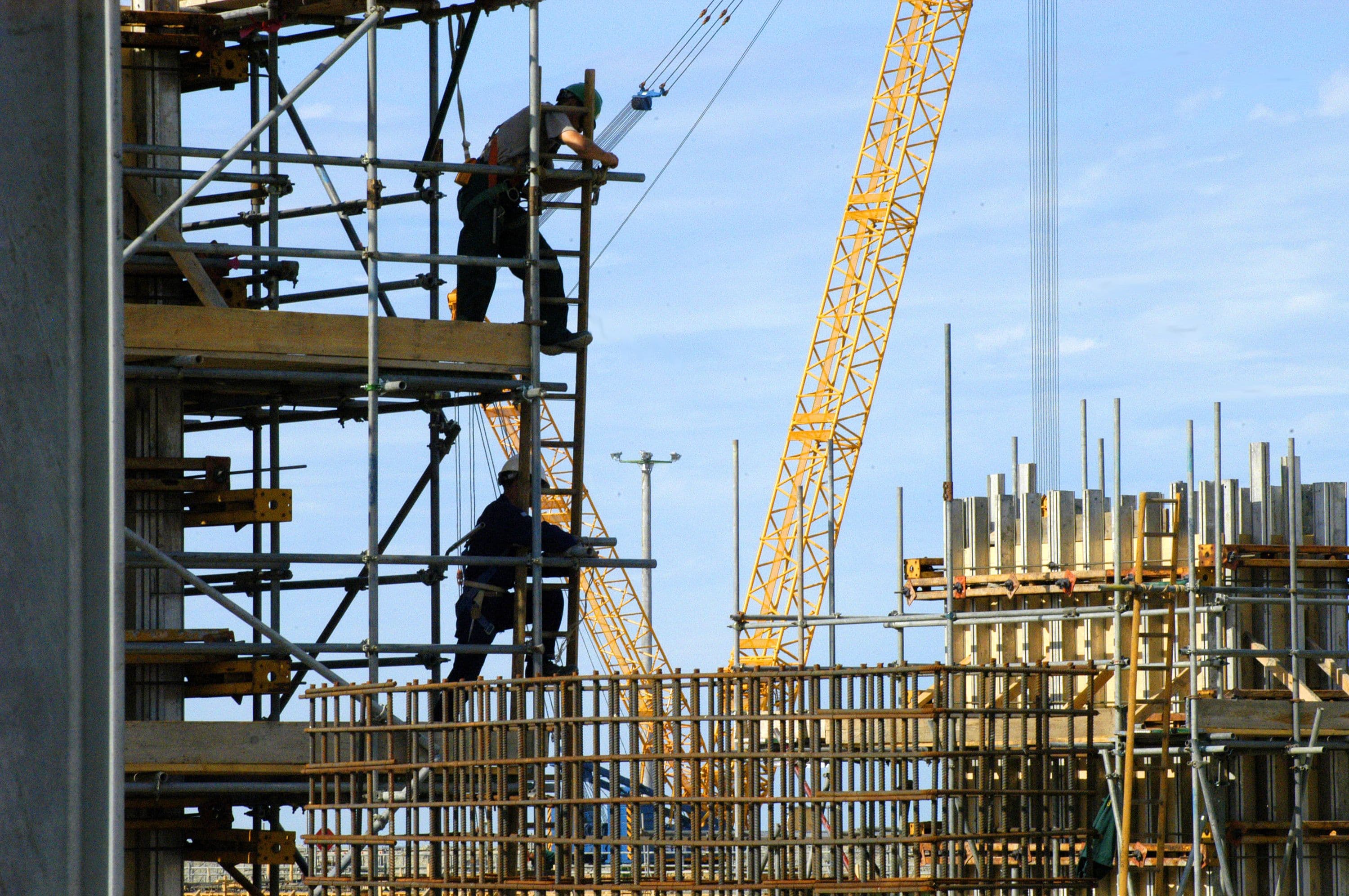 Construction workers on scaffolding